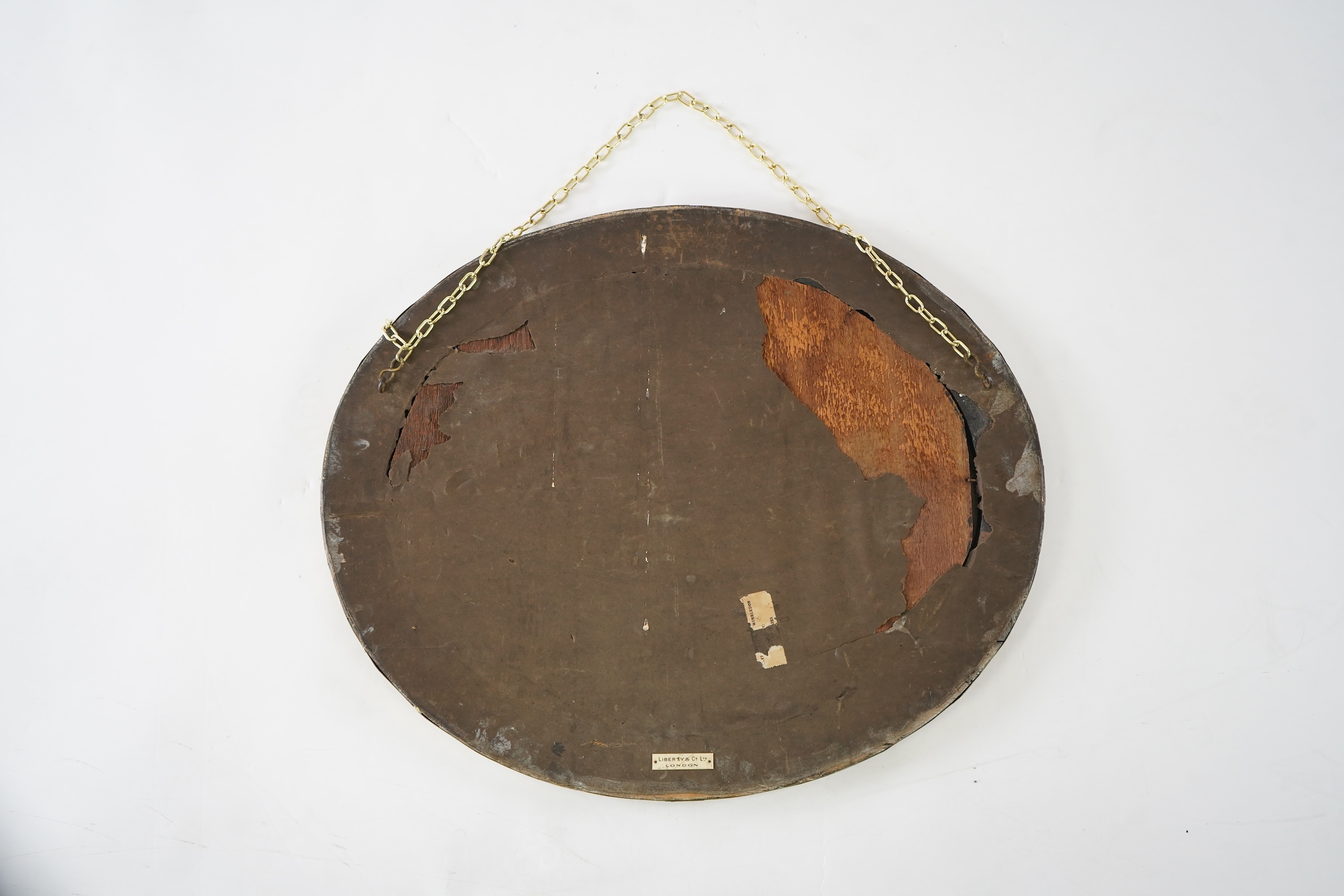 Liberty & Co.: An Arts And Crafts brass and Ruskin pottery cabochon mounted mirror